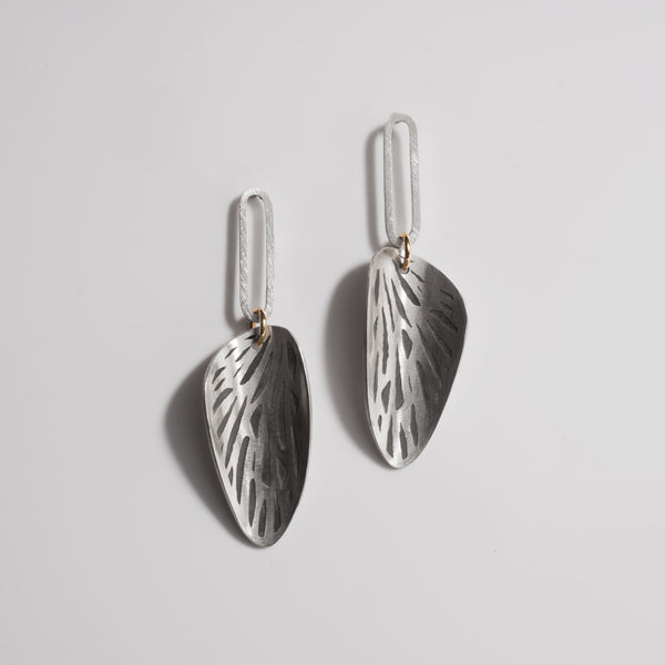 sterling silver etched drop earrings with gold connecting ring from front