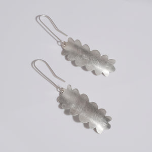 sterling silver elongated flower shaped dangle earrings