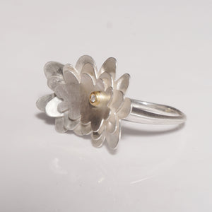 abstract flower layered sterling silver ring with diamond set in gold