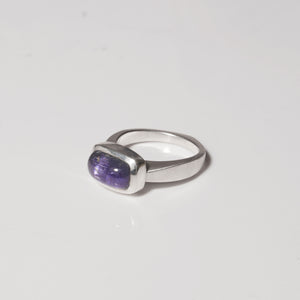 sterling silver sand cast ring with deep tanzanite stone